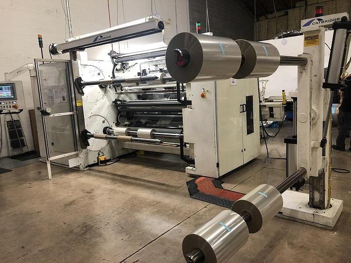 Used 59" WIDE CATBRIDGE DUPLEX TURRET SLITTER REWINDER MFG. 2009