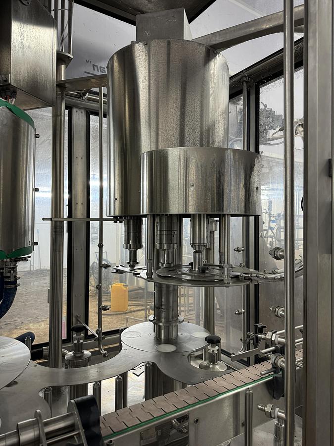 Used 9/3 Rotary Filling line with Integrated Capper 