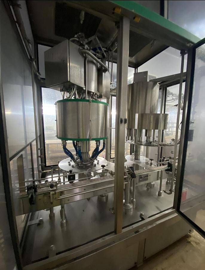 Used 9/3 Rotary Filling line with Integrated Capper 