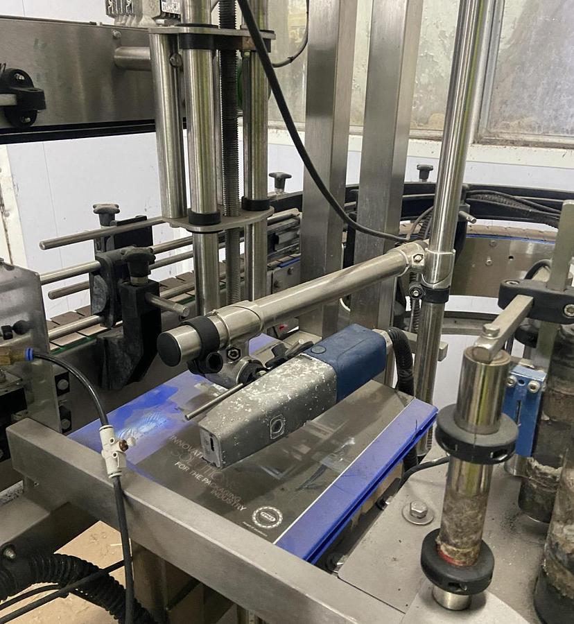 Used 9/3 Rotary Filling line with Integrated Capper 