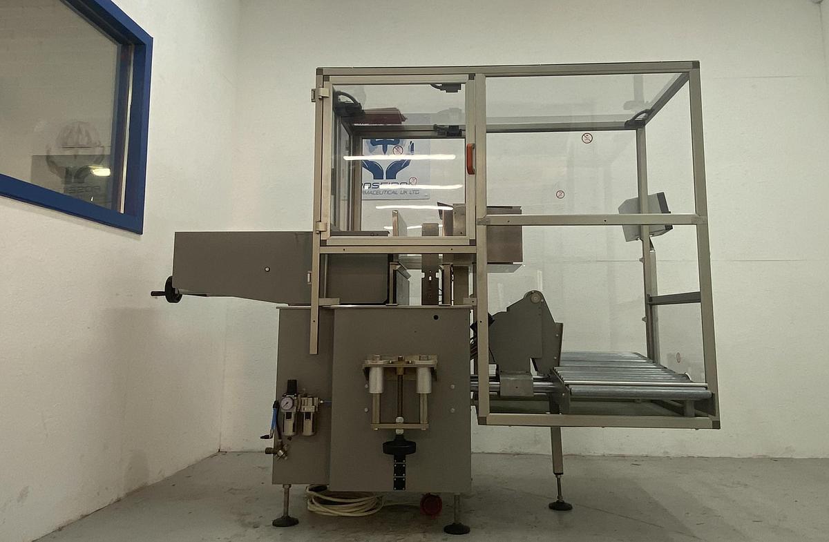 Used Marchesini PS300 semi-auto case packer – fully enclosed version