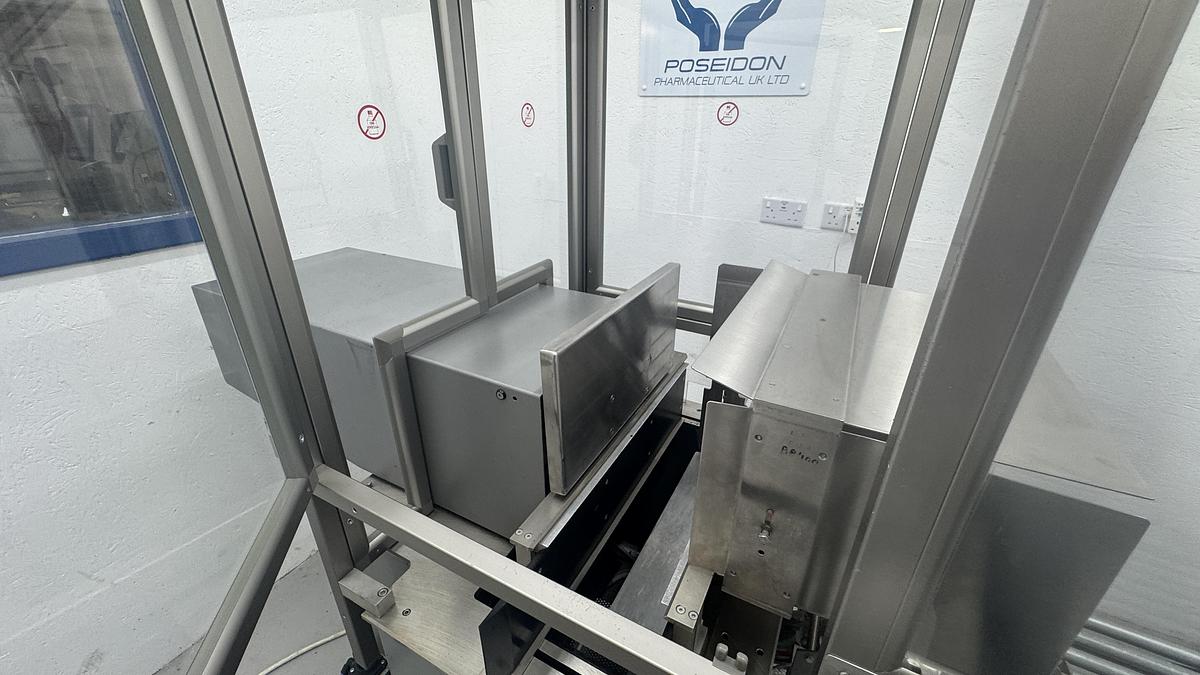 Used Marchesini PS300 semi-auto case packer – fully enclosed version