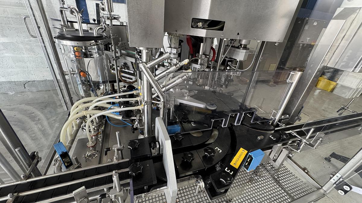 Used Groninger KFVG 201 Filling and Capping Line (spray, pump, over cap, screw and push on)