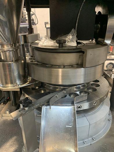 Used Manesty D4 20 station rotary tablet press with rotary feeder