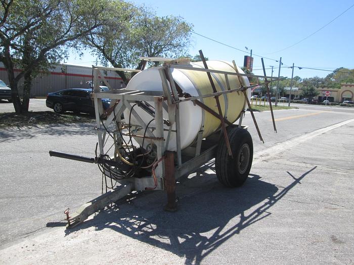 Used 1000 Gallon Pull Behind Boom Sprayer
