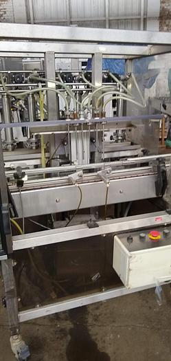 Used Biner 6 head inline piston filler 12 oz