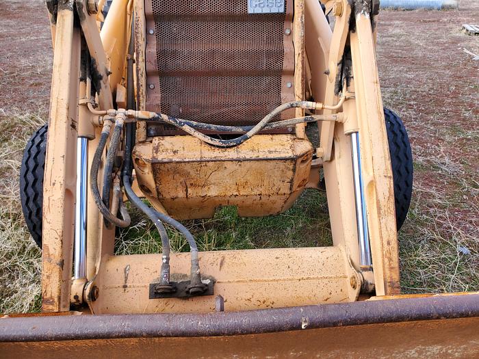 Used Case 580SE Backhoe w/ Attachments