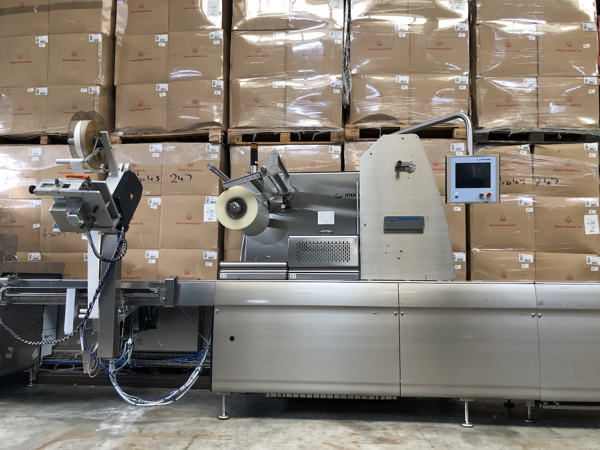 Used Multivac R275mf skin-pack thermoformer with automatic labelling machine