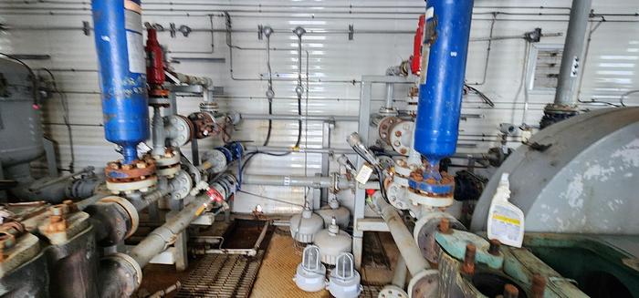 Used Water Injection Building c/w (2) Garner Denver 200 TDE 001 Triplex pumps