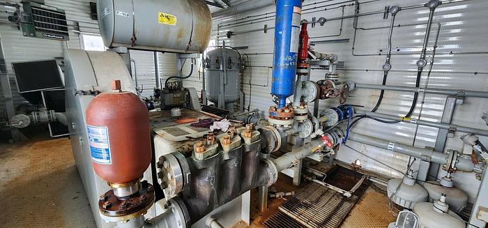 Used Water Injection Building c/w (2) Garner Denver 200 TDE 001 Triplex pumps