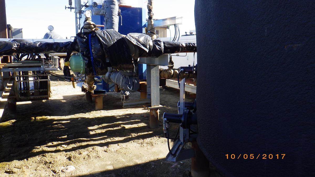 Used 400 BBL Double Wall L-Skidded, EnviroVaullt Heated, Insulated & Internally Coated Tank