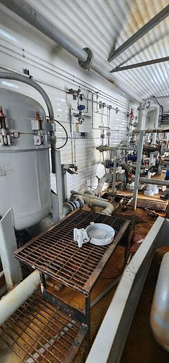 Used Water Injection Building c/w (2) Garner Denver 200 TDE 001 Triplex pumps