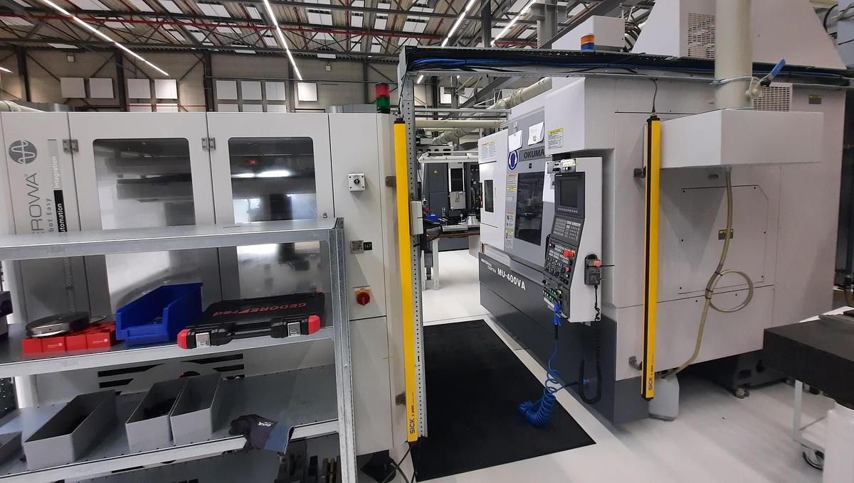 Used 2004 OKUMA MU400VA + EROWA automation