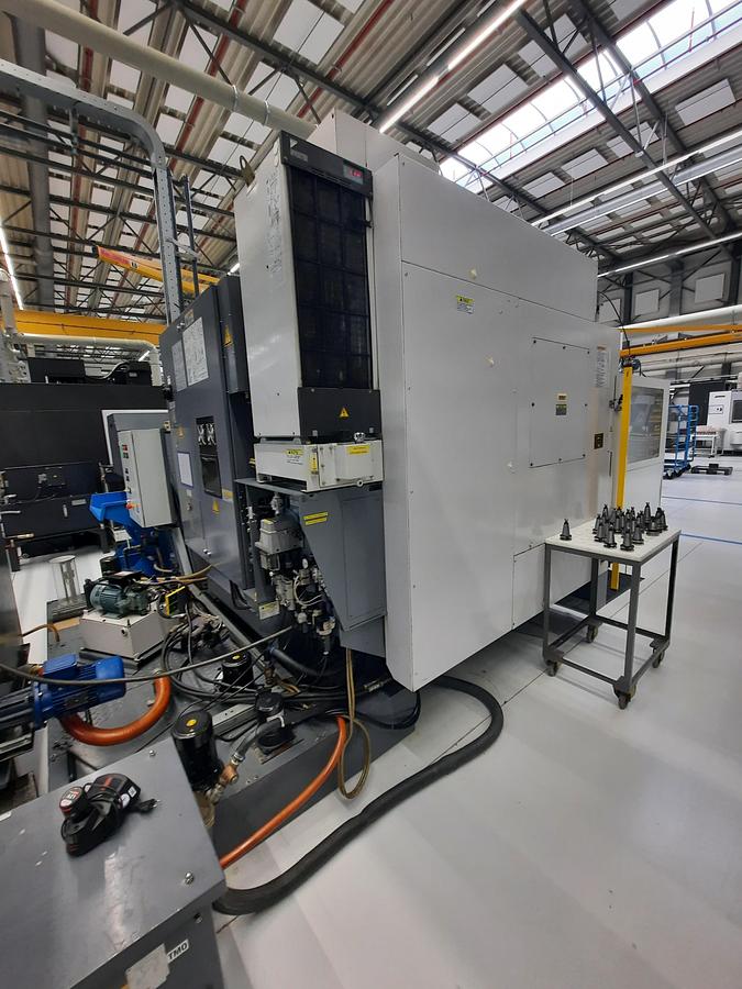 Used 2004 OKUMA MU400VA + EROWA automation