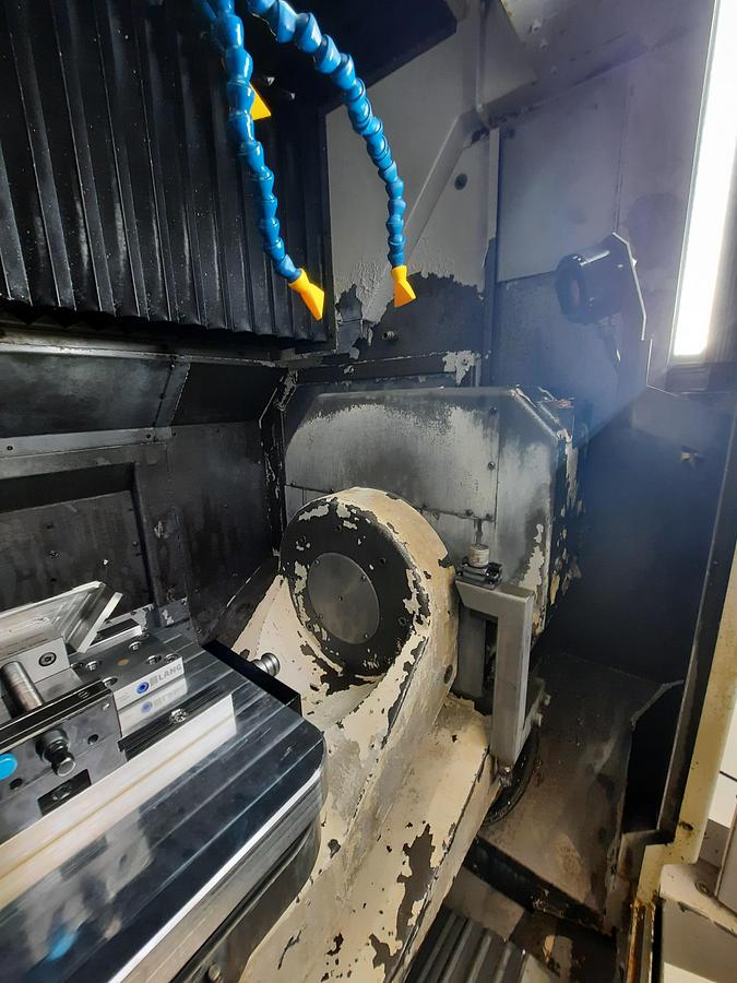 Used 2004 OKUMA MU400VA + EROWA automation