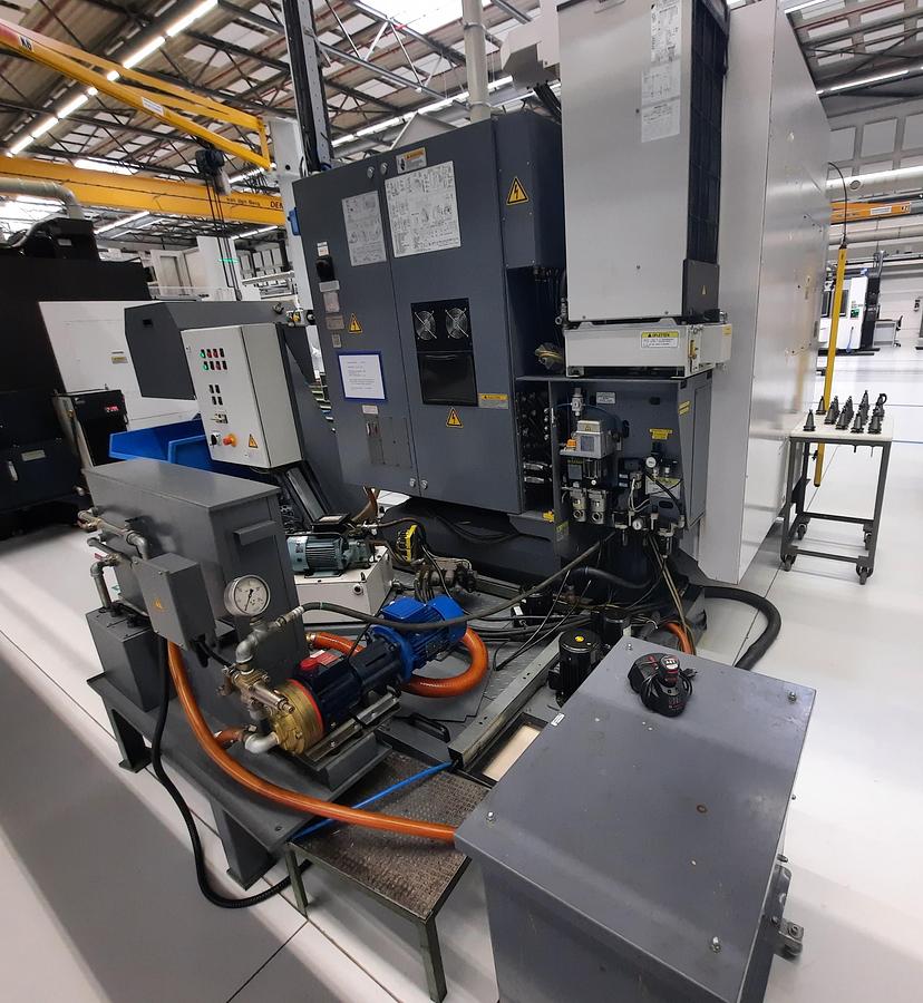 Used 2004 OKUMA MU400VA + EROWA automation