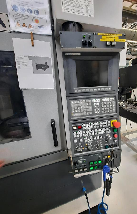 Used 2004 OKUMA MU400VA + EROWA automation