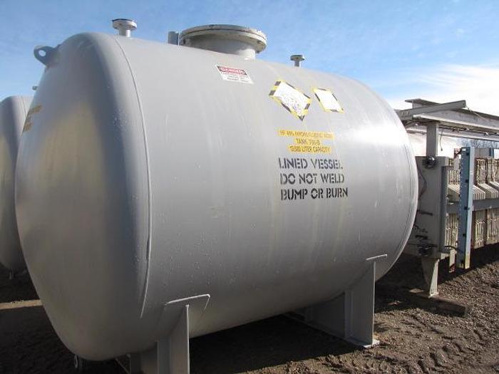 D'occasion USED 3420 GALLON TANK (VESSEL), RUBBERLINED STEEL, HORIZONTAL