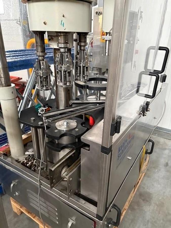 Gebraucht Seitz Compacta/Alcoa/TLG/Kosme/Strapex Abfüll- und Verpackungslinie für Spirituosen (Glasflaschen)