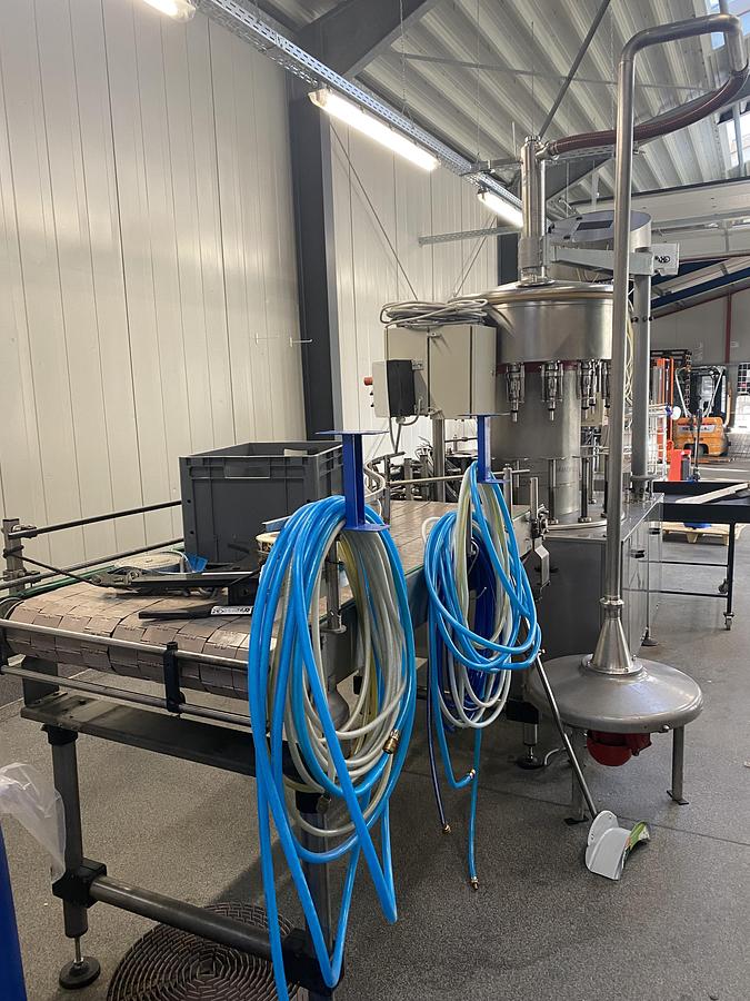 Gebraucht Seitz Compacta/Alcoa/TLG/Kosme/Strapex Abfüll- und Verpackungslinie für Spirituosen (Glasflaschen)