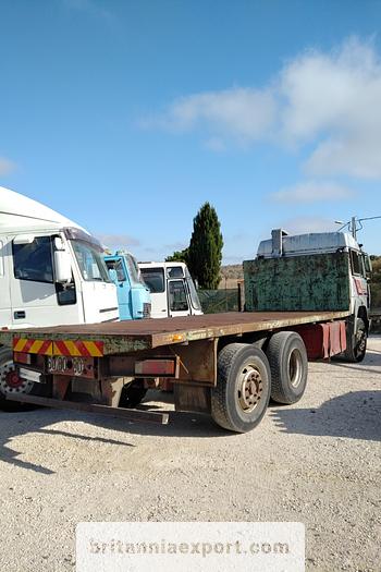 Used 1990 Iveco Turbostar 190-36 6X2 flatbed truck.