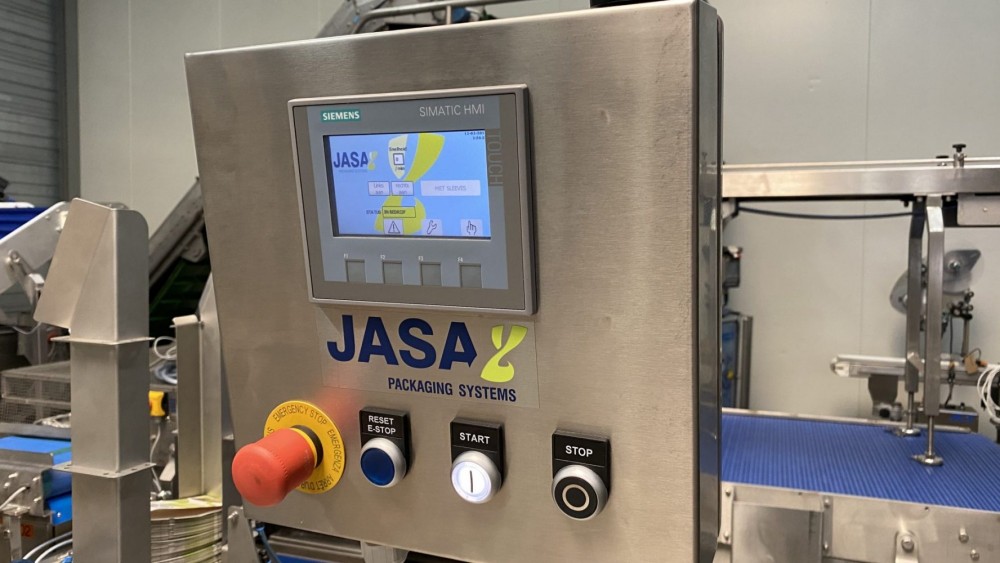 Used Fully automatic twin lane Jasa sleever, brand new