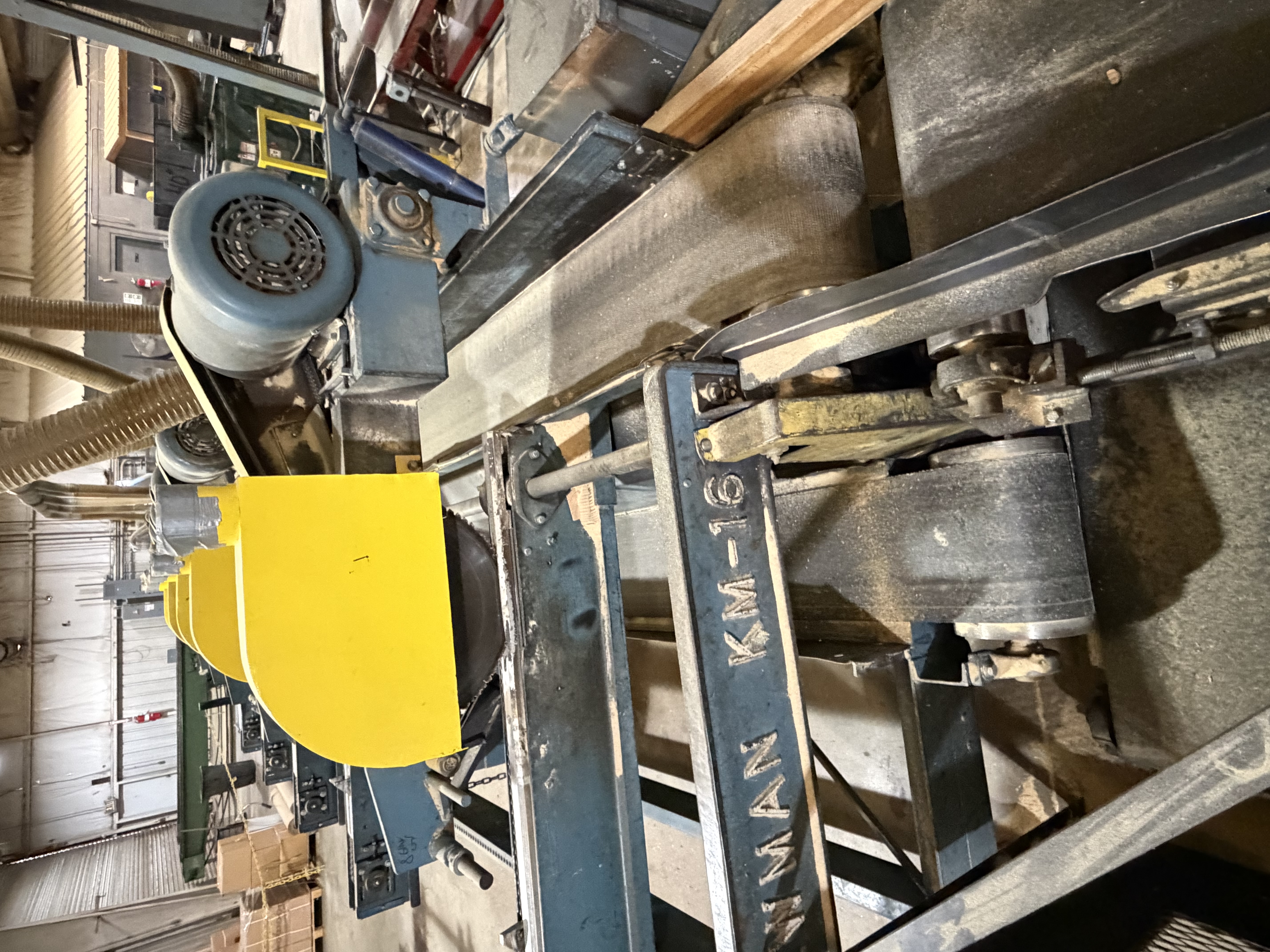 Used Newman KM16 Multiple Head Trim Saw