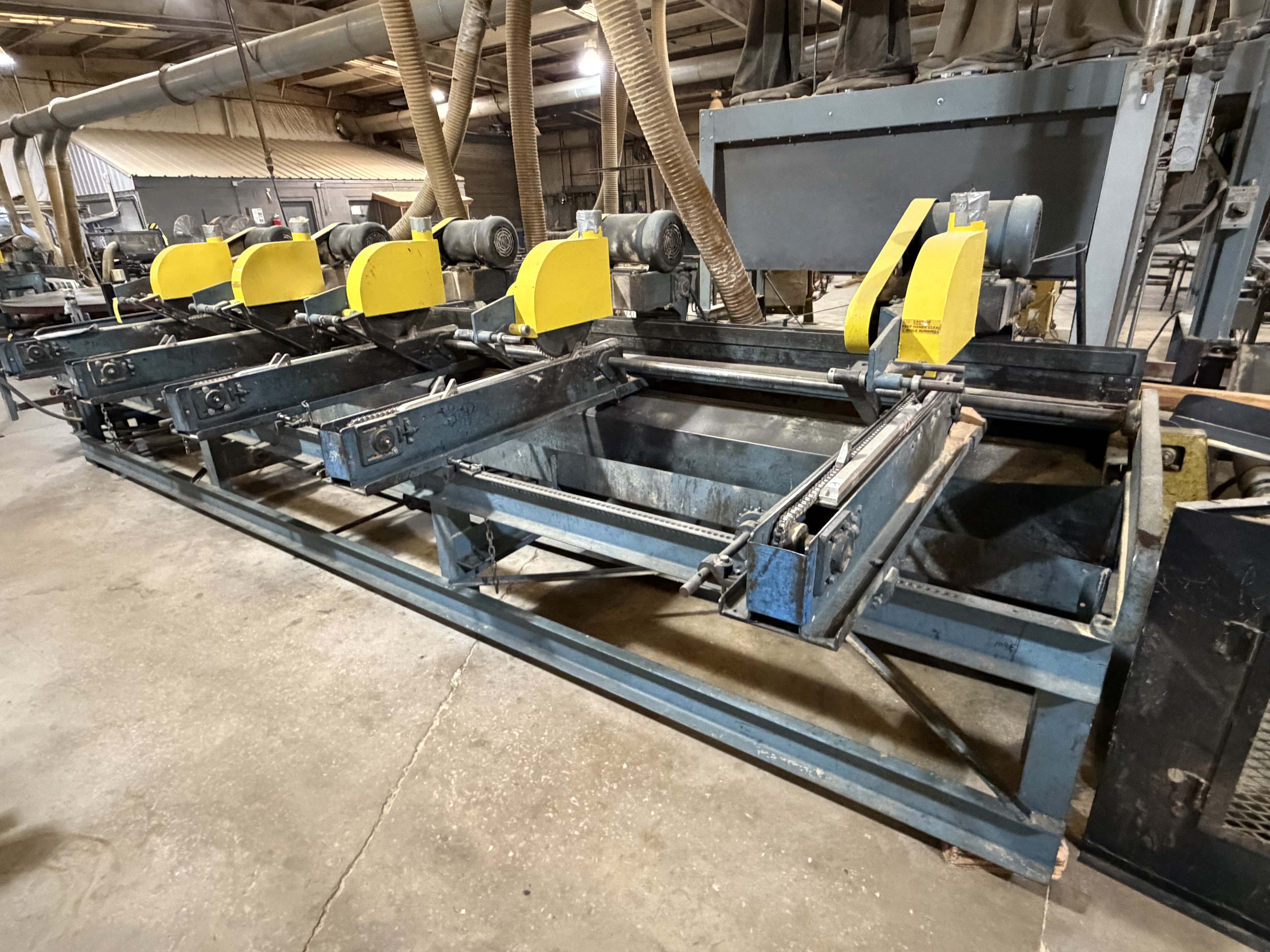 Used Newman KM16 Multiple Head Trim Saw