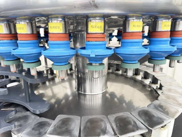 Used Filler Specialties 30/10 Mono-Block Bottle Filler-Capper with Waterfall Style Cap Sorter-Feeder