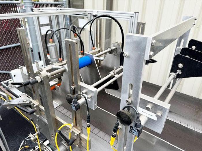 Used Hamrick Automatic Case Packer with Servo Laner