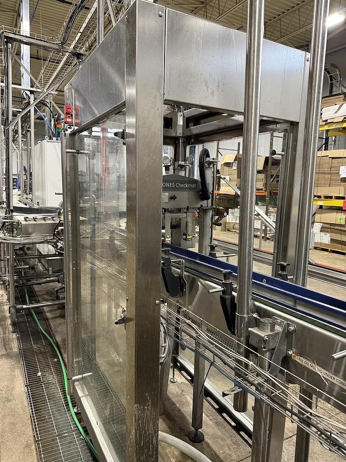 Used Complete Beverage Canning Line with Krones 28v Can Filler and Ferrum Can Seamer 