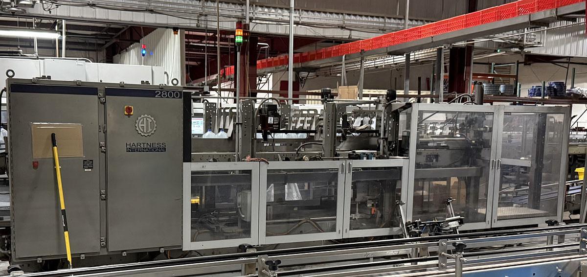Used Hartness Model 2800 Automatic Servo Case Packer with Laner