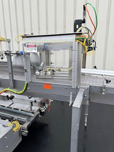 Used Hamrick Automatic Case Packer with Servo Laner