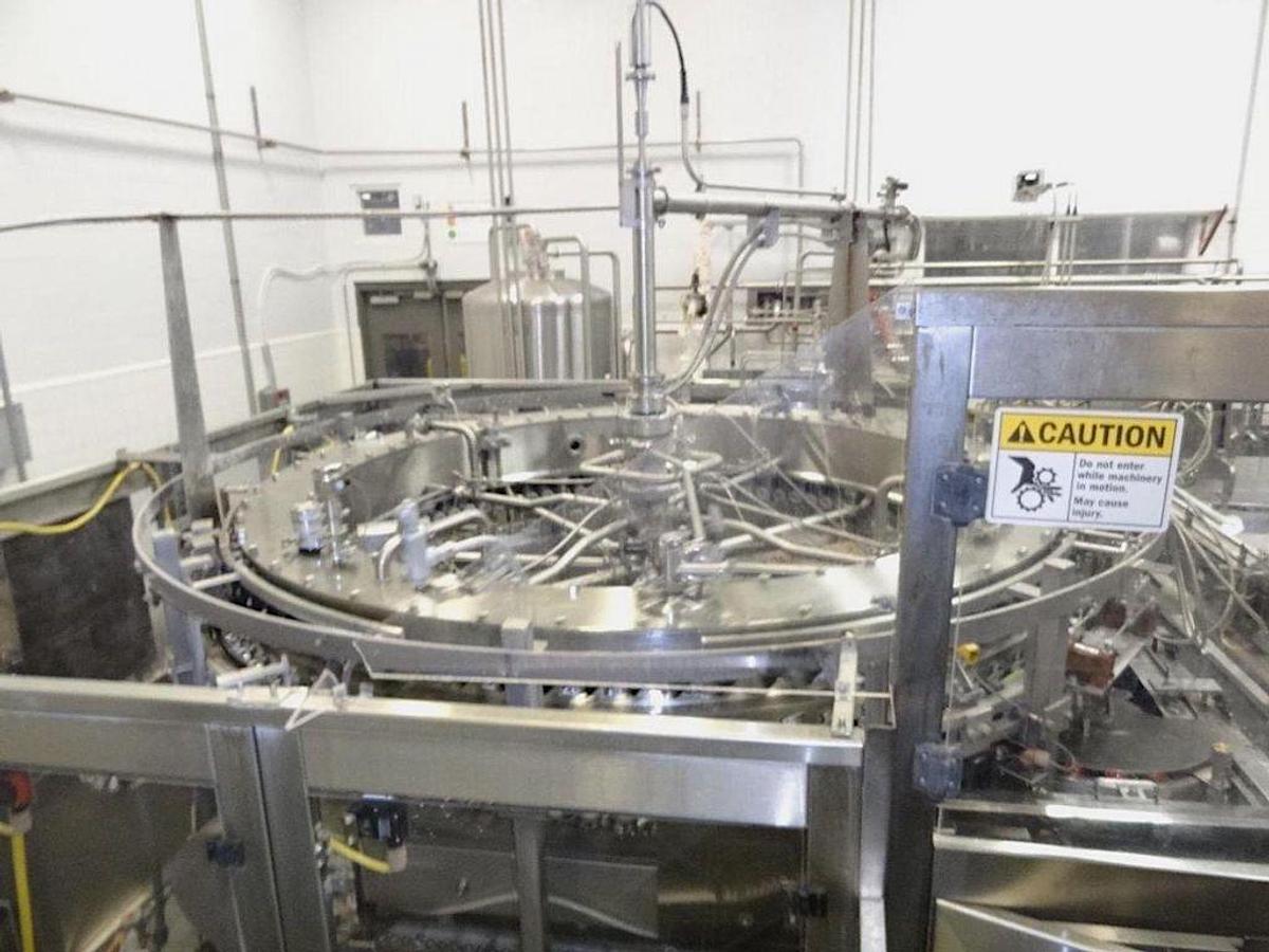 Used H&K 92 Valve Can Filler and Angelus 12 head Seamer model 120L 