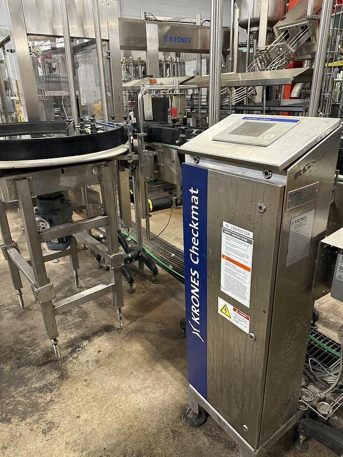 Used Complete Beverage Canning Line with Krones 28v Can Filler and Ferrum Can Seamer 