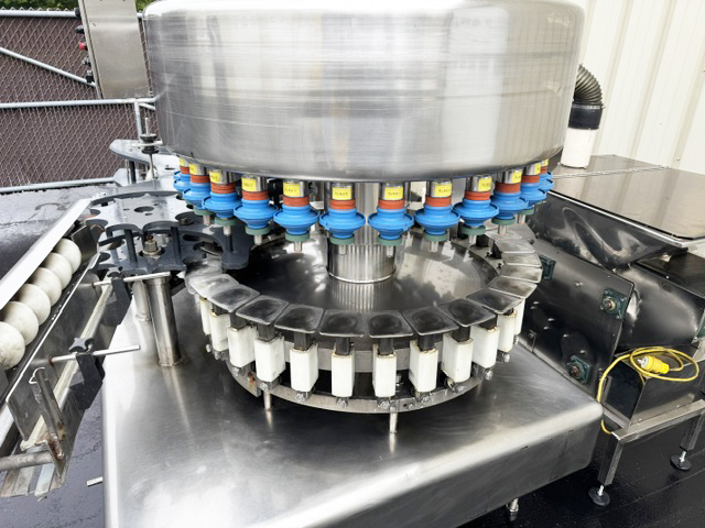 Used Filler Specialties 30/10 Mono-Block Bottle Filler-Capper with Waterfall Style Cap Sorter-Feeder