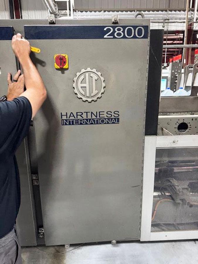 Used Hartness Model 2800 Automatic Servo Case Packer with Laner