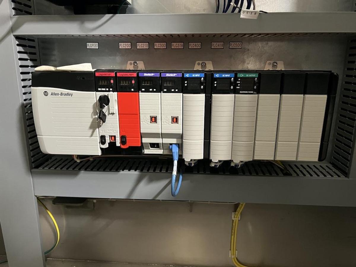 Used used Angelus 121L Seamer with ancillary; control panel, chain and lube panel