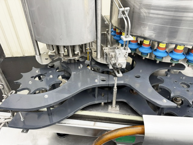 Used Filler Specialties 30/10 Mono-Block Bottle Filler-Capper with Waterfall Style Cap Sorter-Feeder