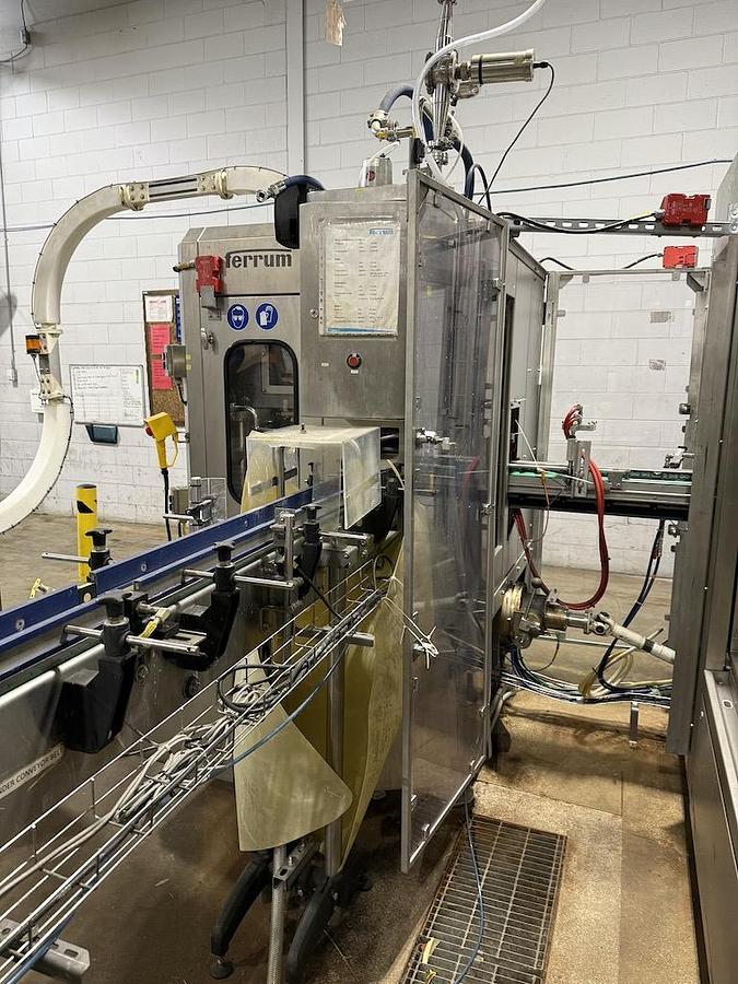 Used Complete Beverage Canning Line with Krones 28v Can Filler and Ferrum Can Seamer 