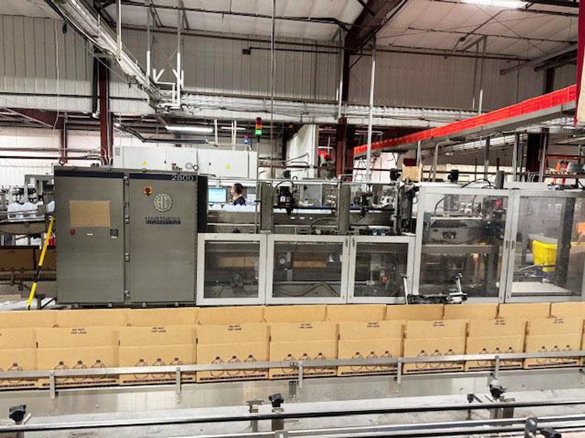 Used Hartness Model 2800 Automatic Servo Case Packer with Laner