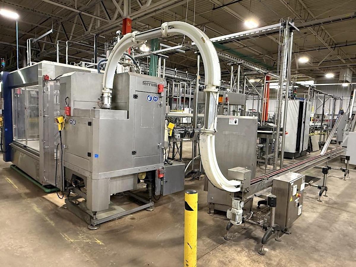 Used Complete Beverage Canning Line with Krones 28v Can Filler and Ferrum Can Seamer 