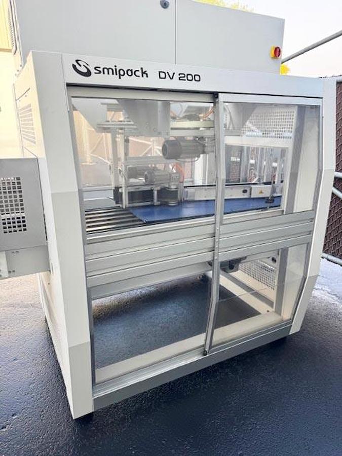 Used SMIpack Automatic Overlap Shrink Wrapper + Tray Former + Laner