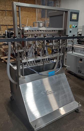 Used Liquid Packaging Solutions 8 Head Inline auto filler - pressure gravity