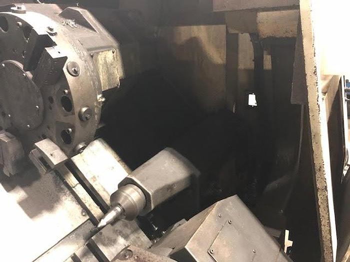 Used 1996 OKUMA LU15 CNC Lathe, Twin Turret, Tailstock, OSP 7000L Control