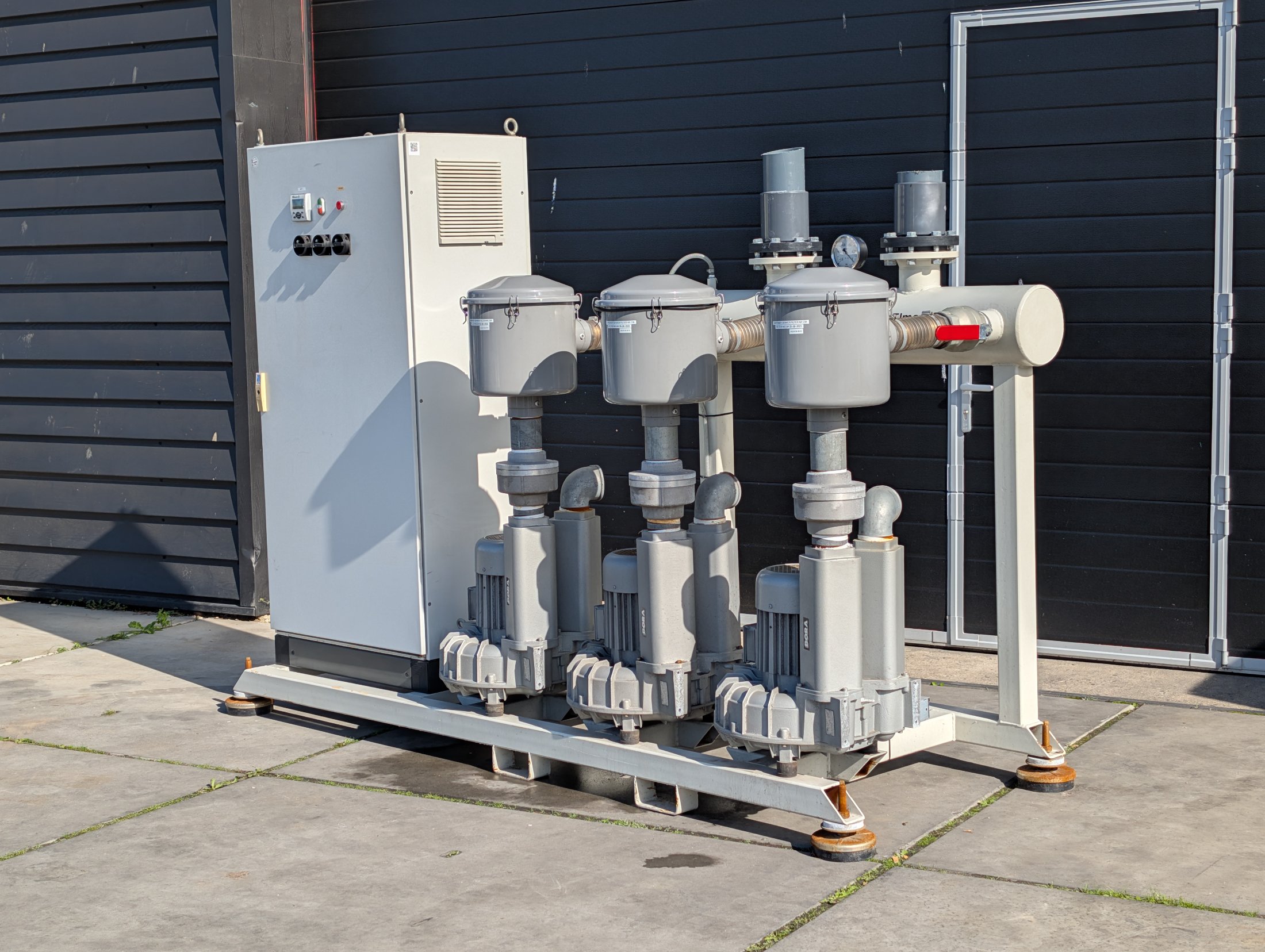 Used Bora SAP 450 three-pump vacuum unit with control cabinet