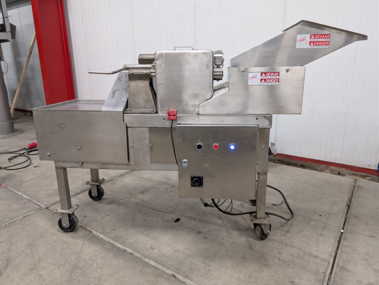 Used Urschel stainless steel cutting machine with hopper