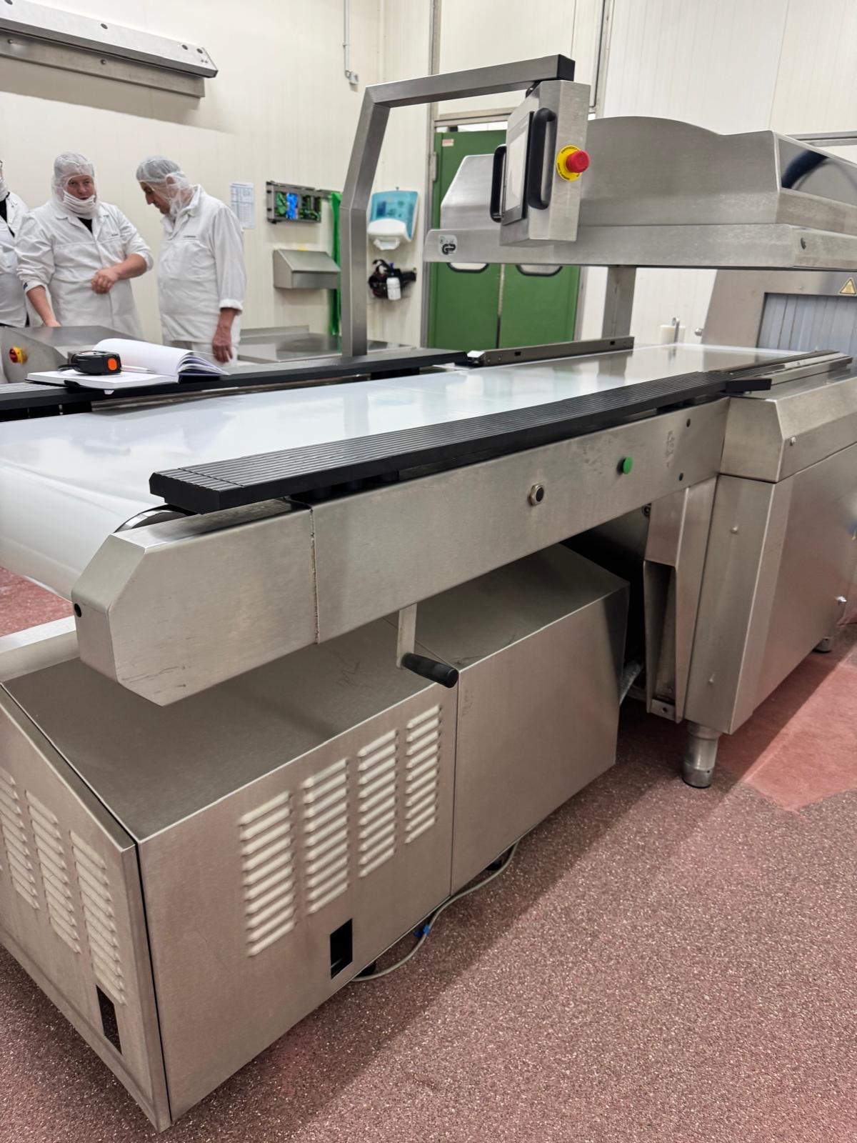 Used VC999 K7B2 conveyorized chamber vacuum packaging machine