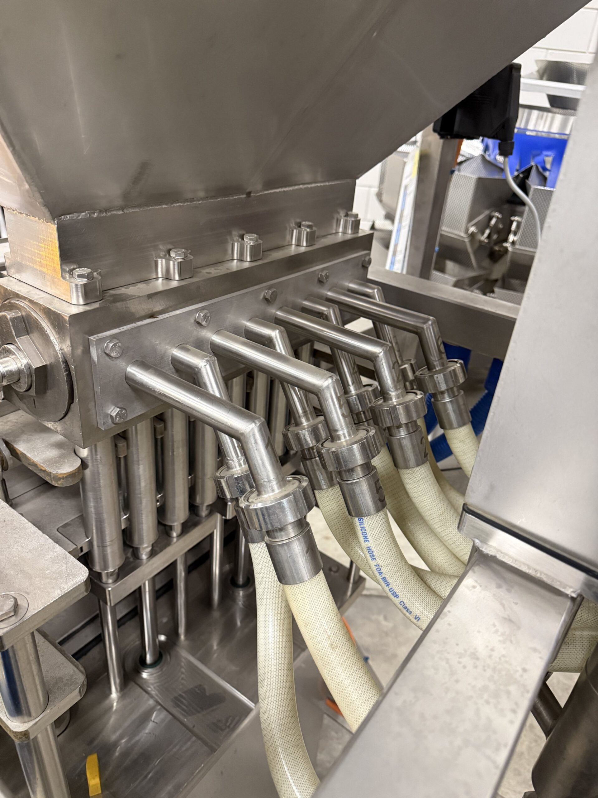 Used 8-head volumetric liquid filler for brine and sauces