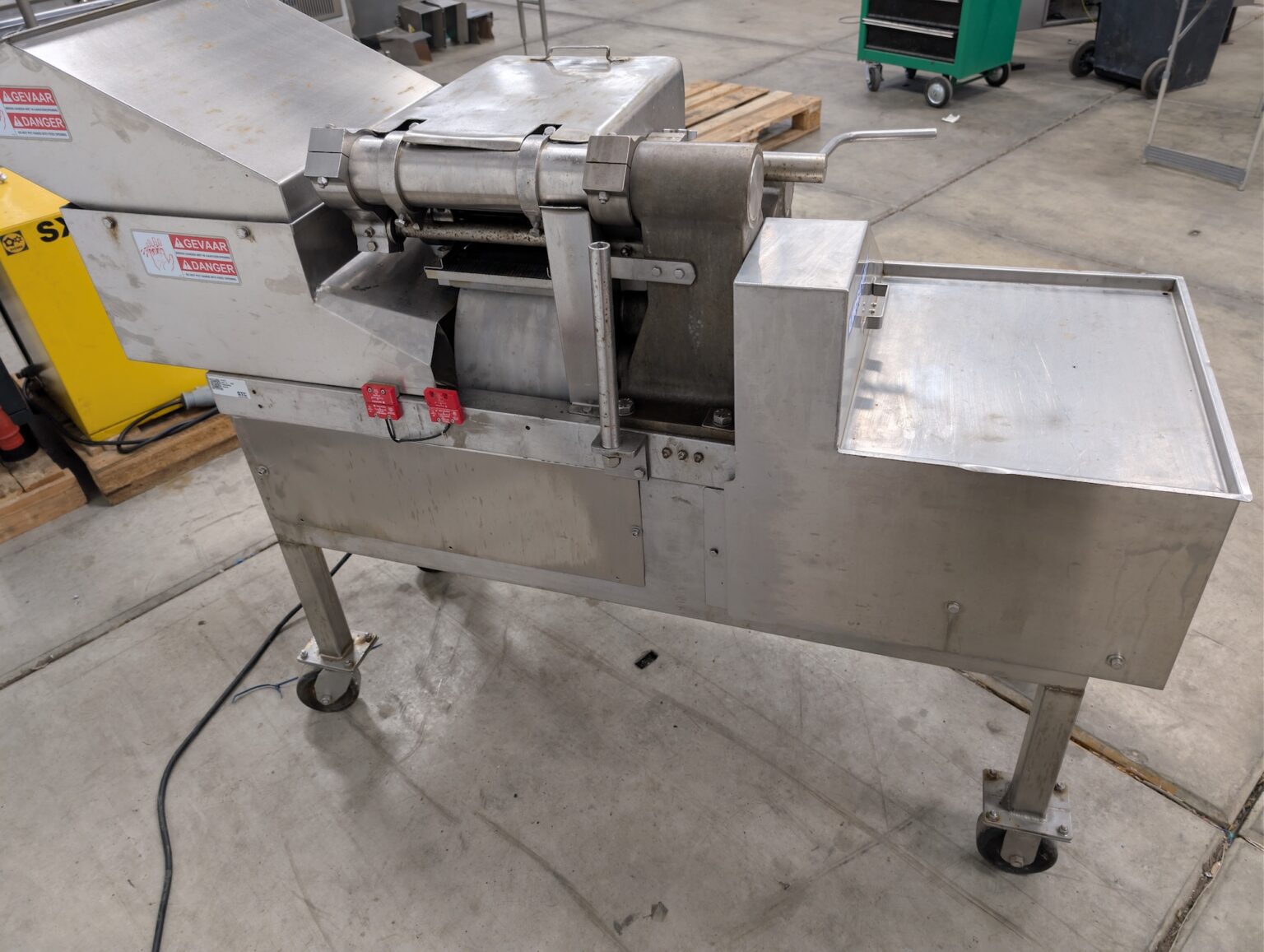 Used Urschel stainless steel cutting machine with hopper